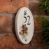Oval Ceramic House Number with Pansy Design