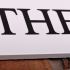 Granite House Sign 45.5 x 10cm 1 Line with sandblasted and painted background