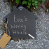 Slate house shaped garden sign, complete with chalk. 