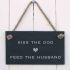 Kiss the dog, and feed the husband - slate hanging sign