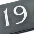 Slate house number 19 v-carved with white infill number