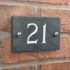 Slate house number 21 v-carved with white infill numbers