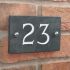 Slate house number 23 v-carved with white infill numbers