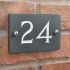Slate house number 24 v-carved with white infill numbers