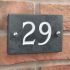 Slate house number 29 v-carved with white infill numbers
