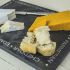 Cheese board in slate with named cheeses border