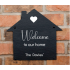Rustic 'Welcome to our home' slate house shaped sign. 