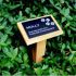 Wooden stake with anodised aluminium plaque